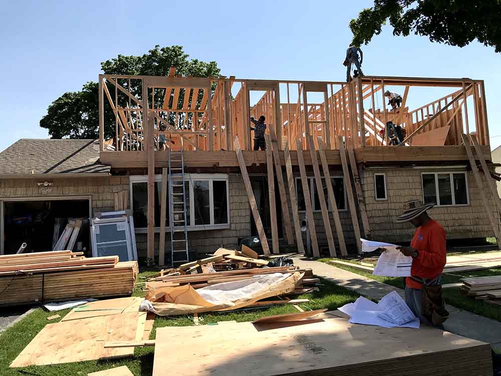 Second story framing in progress - Full dormer addition on a Bethpage NY house