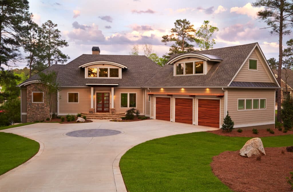 Exterior of beautiful modern home with arched dormer windows