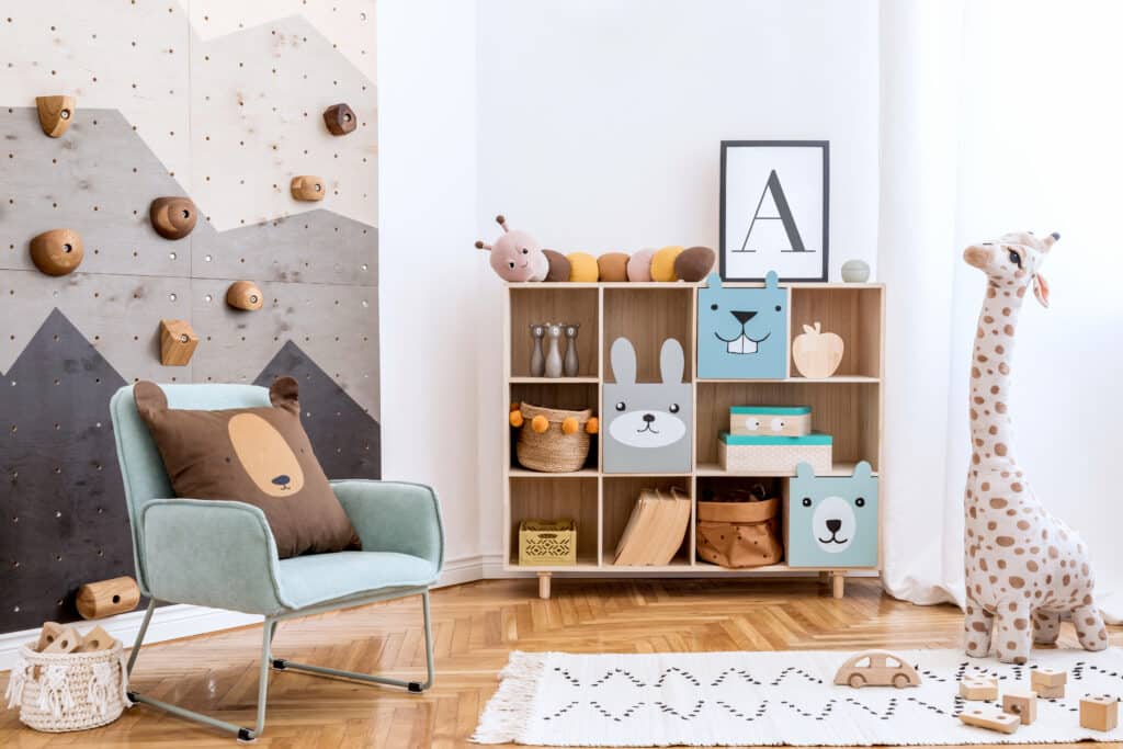 Scandinavian playroom design with climbing wall