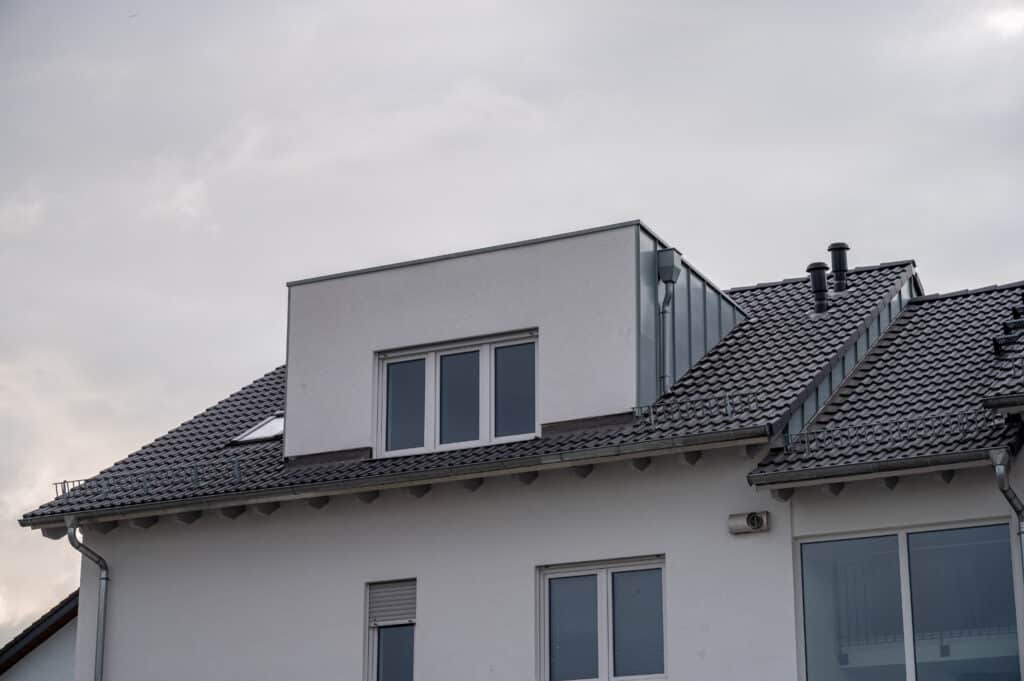 Flat roof dormer on a modern house